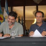 Firma del acta acuerdo por el convenio entre el municipio y el OPISU